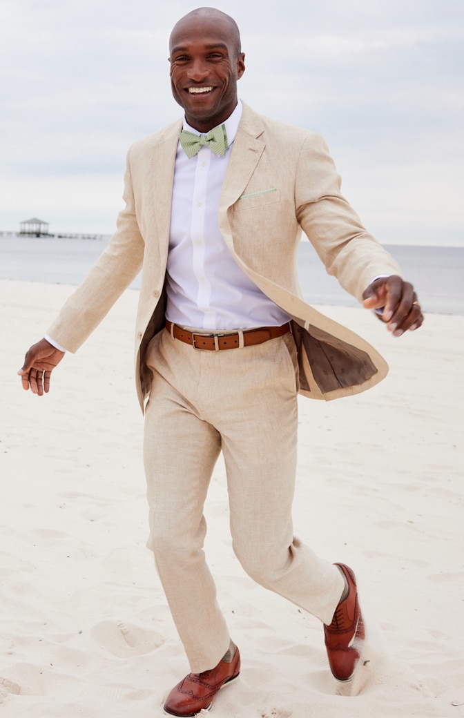 Tan fashion suit with black shoes